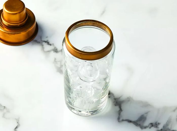 A shaker filled with ice cubes