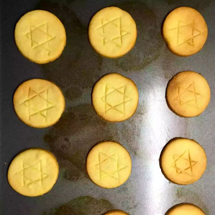 A tray of Chanukah Cookies decorated with Star of David designs