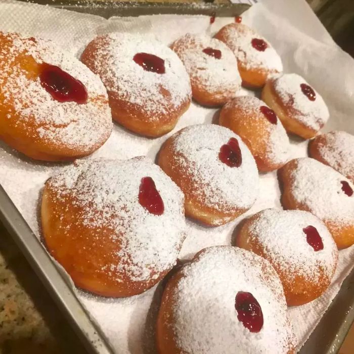 Sufganiot arranged on a baking dish