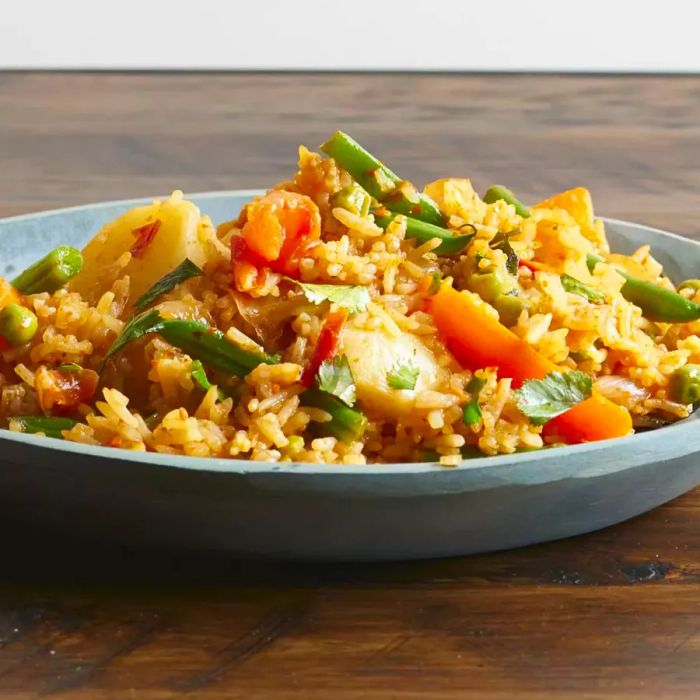 A close-up of a bowl of veggie biryani