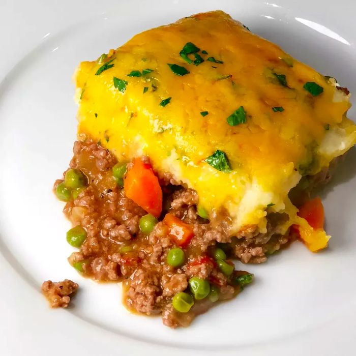 A Scotsman's Shepherd's Pie served on a white plate.