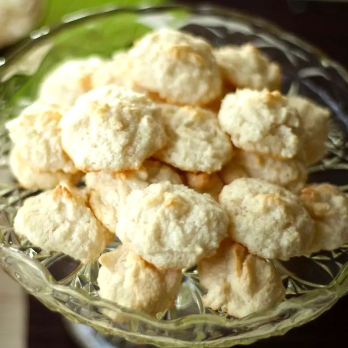 A top-down view of a plate full of assorted German Christmas cookies