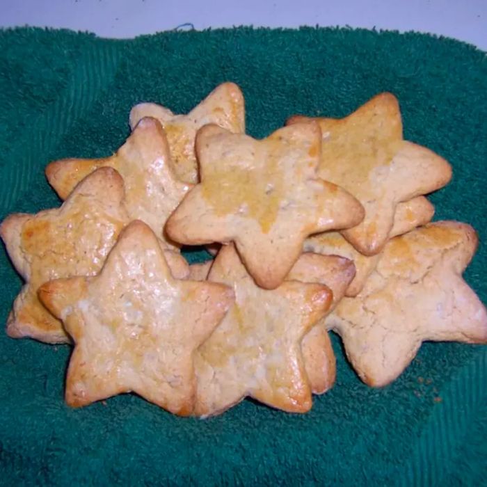 A top-down view of a stack of zimtsterne cookies