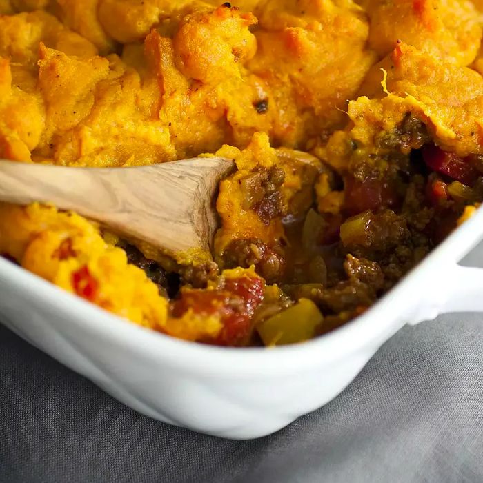 Autumn Sweet Potato Shepherd's Pie served in a white dish.