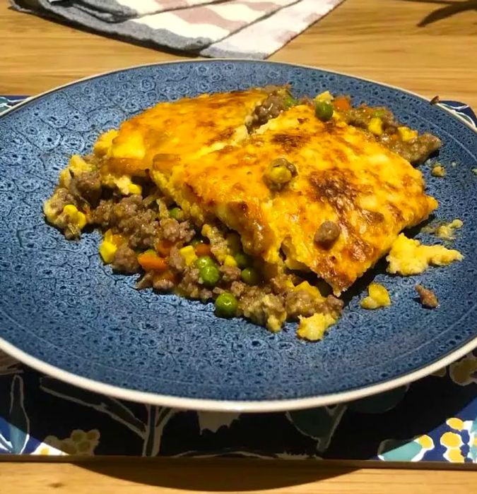 Chef John's Irish Shepherd's Pie served on a blue plate.