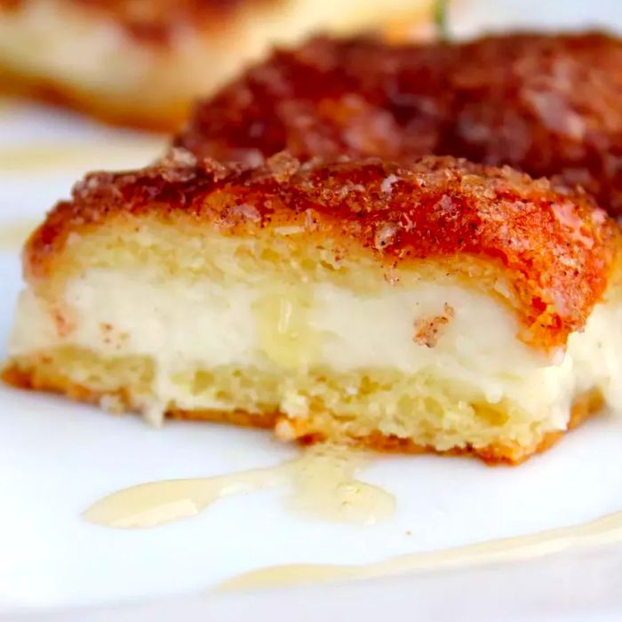 Sopapilla Cheesecake Pie served on a white plate