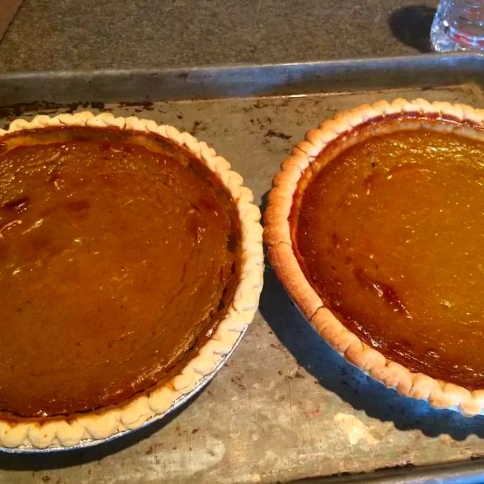 Grandma's Sweet Hubbard Squash Custard Pie resting on a baking sheet