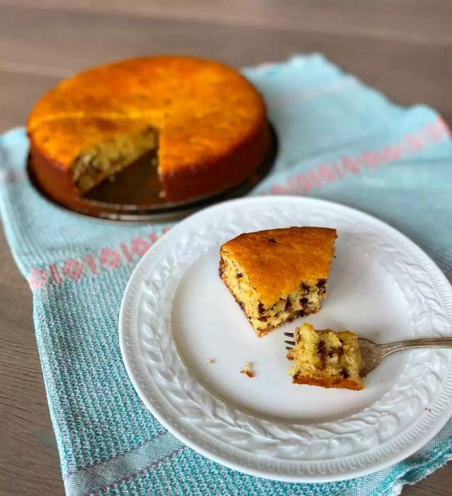 A slice of easy yogurt cake served on a plate