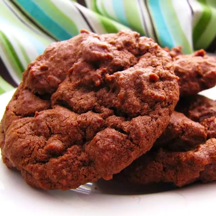 A plate full of freshly baked Chocolate Chocolate Chip Cookies