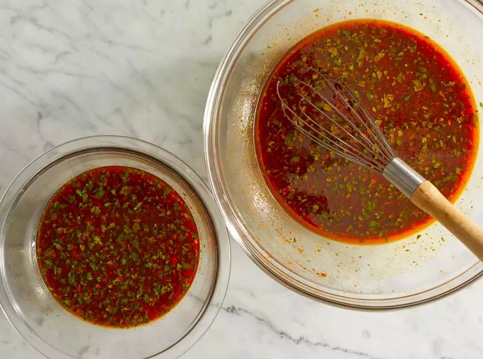 Mix the marinade ingredients in a large bowl, reserving some for later use when serving.