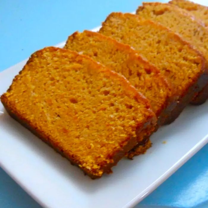 sliced pieces of sweet potato bread neatly arranged on a tray