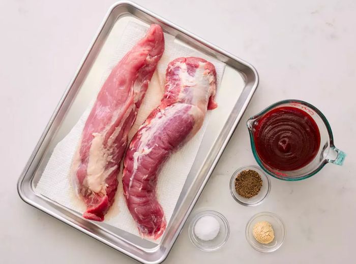 All ingredients are prepared and ready to make grilled pork tenderloin.