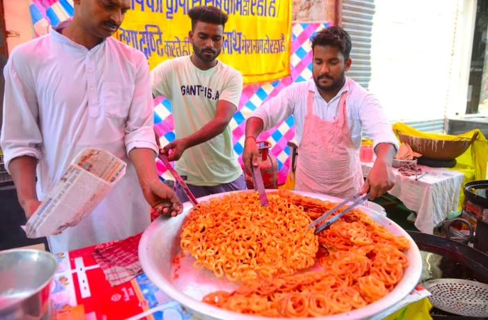 In Northern India, jalebi – crispy, batter-fried spirals – are a much-loved treat, often paired with condensed milk and dusted with fragrant spices.