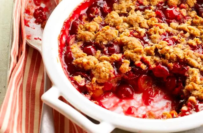 Close-up of cherry crisp with a crunchy oatmeal topping