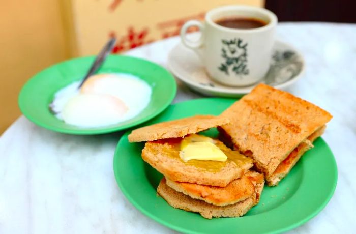 Kaya toast: A delightful breakfast sandwich filled with fragrant jam.