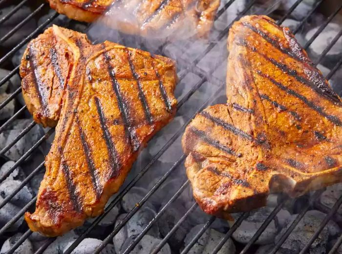 Rock's T-Bone Steaks grilling to perfection