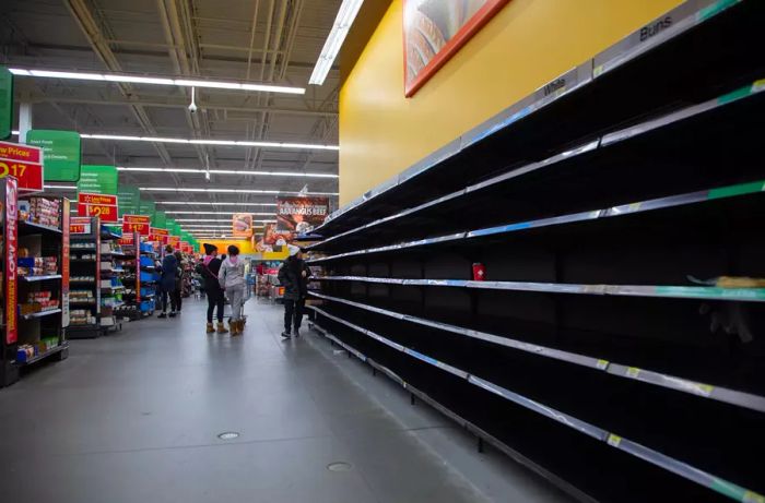 Empty supermarket shelves seen as people stock up on food and essentials in fear of supply shortages, Brampton, Canada, March 22, 2020. (Photo by Sayed Najafizada/NurPhoto via Getty Images)