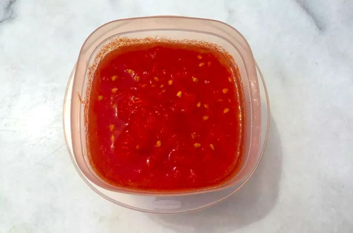 stewed tomatoes in a container