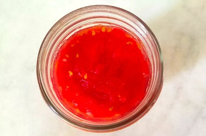 tomatoes in a can, covered with liquid