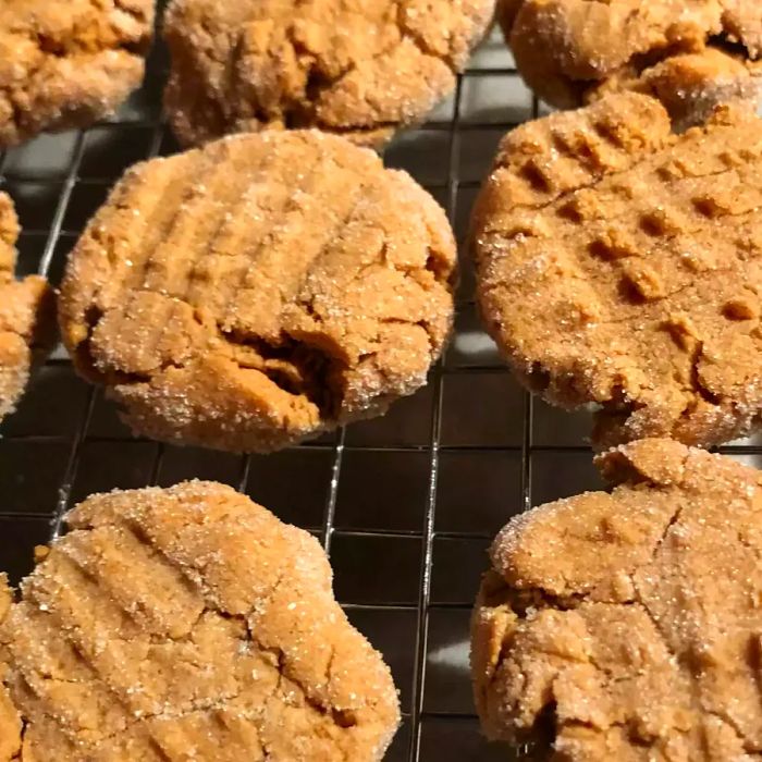 peanut butter cookies cooling on a rack