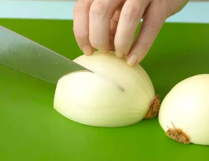 101913168_Slicing-through-Onion-before-chop_Photo-by-Meredith.jpg