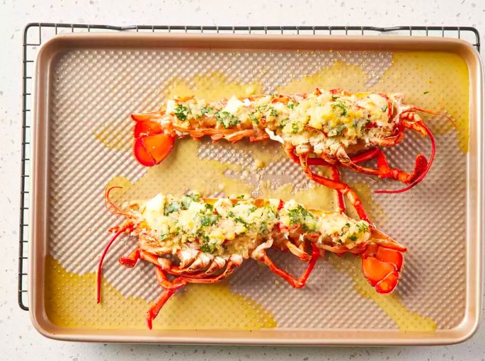 A baking tray with lobster thermidor after broiling