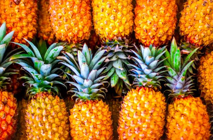 Close-up Shot of Pineapples at a Local Market