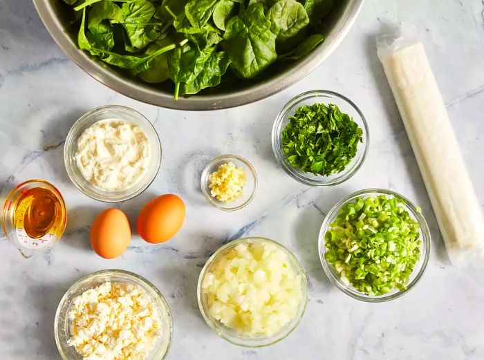 All the ingredients are ready to make spanakopita.