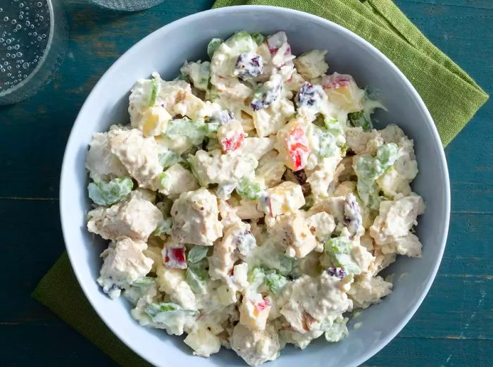 A top-down view of a large bowl filled with healthy chicken salad