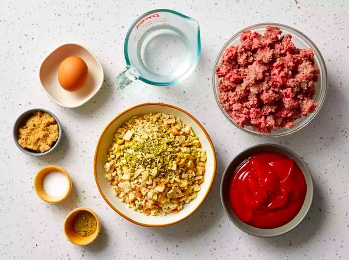 Ingredients for Stovetop Stuffing Meatloaf laid out on a kitchen counter