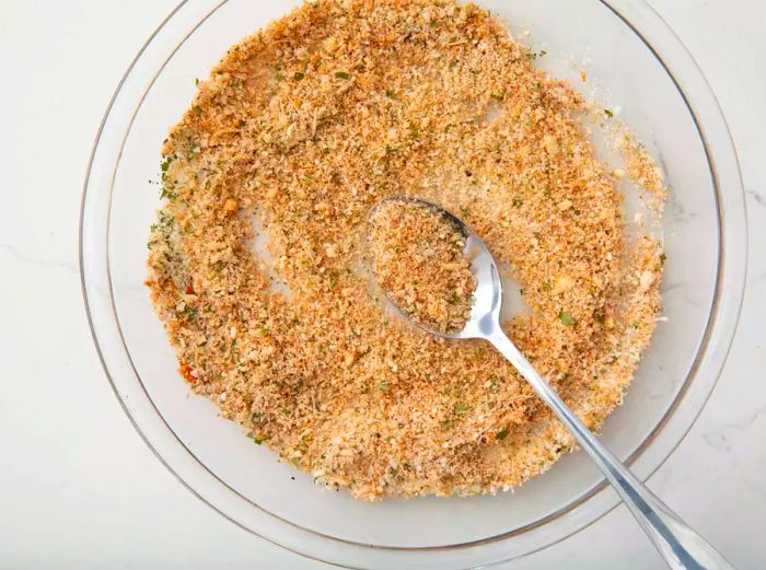 Top-down view of the Parmesan and spice mixture in a bowl