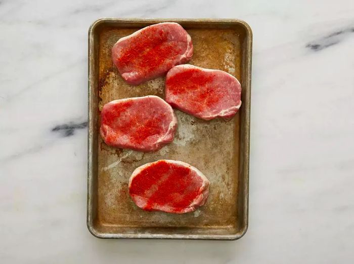 Top view of the seasoned pork chops