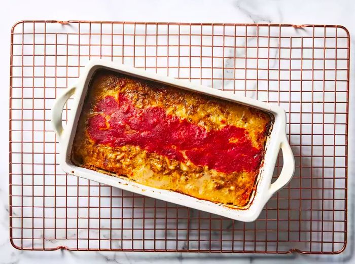 The meatloaf is baked until the top is golden and crisp.