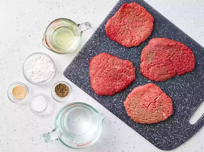 All ingredients are ready to prepare the cube steak.