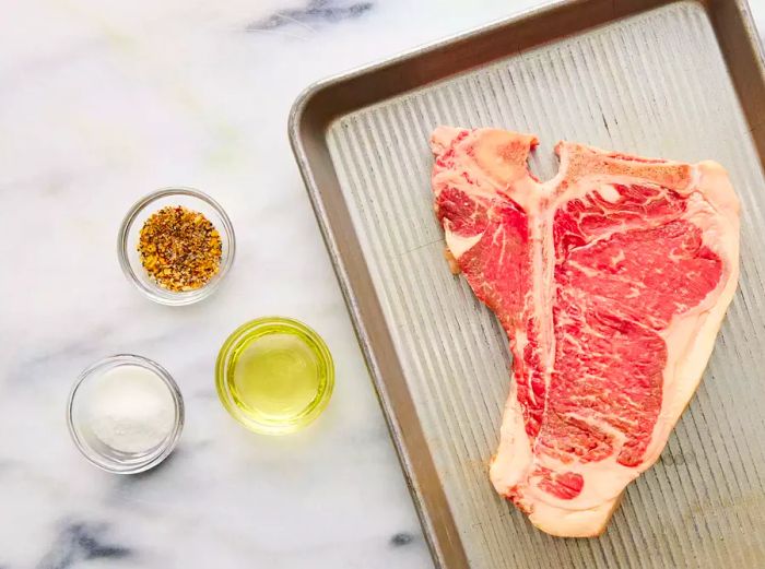 All ingredients are ready for preparing the perfect porterhouse steak.