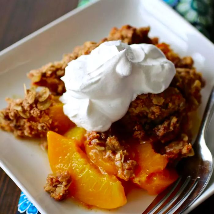 Peach crisp with whipped topping