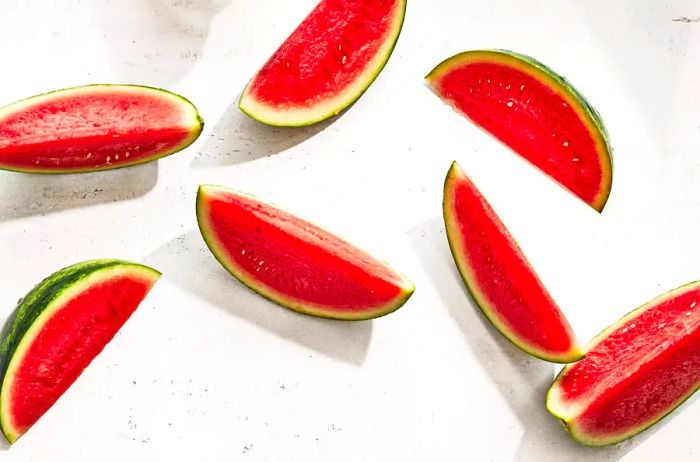 Watermelon slices on a marble surface