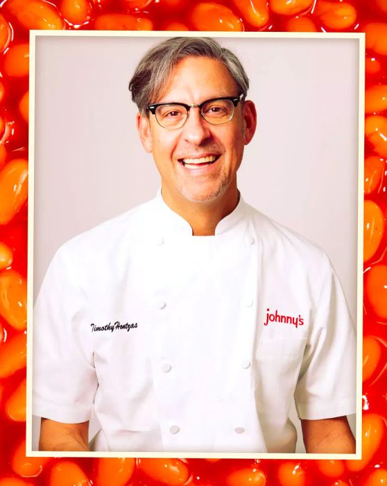 Tim Hontzas dressed in chef whites