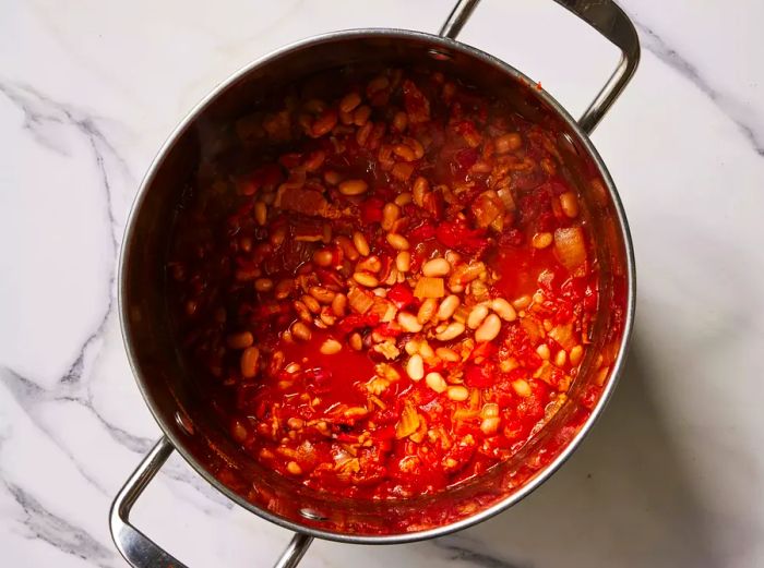 A large pot of pinto beans simmered with bacon and flavorful seasonings