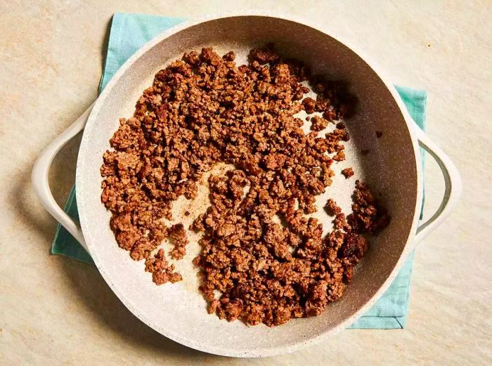 browned ground beef in skillet