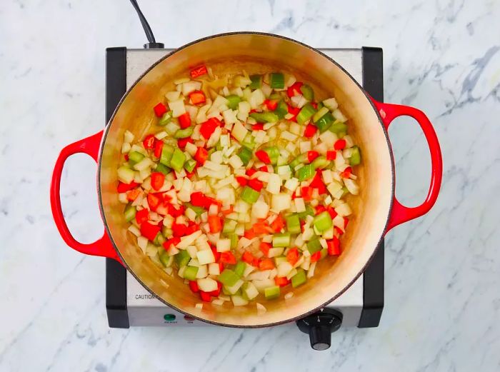 Aerial view of sautéed mirepoix in a pot