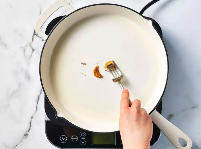 garlic browned and mashed using a fork