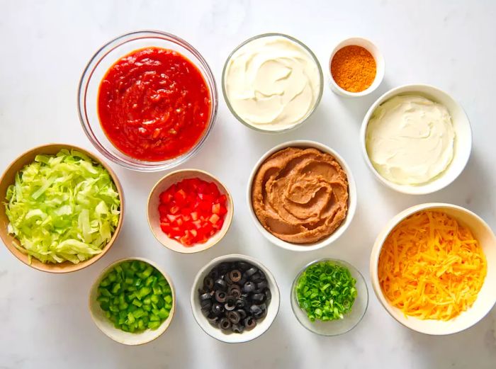 Ingredients for making a seven-layer taco dip