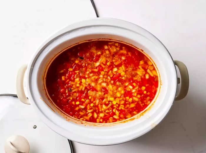 A crockpot filled with hearty chicken taco soup.