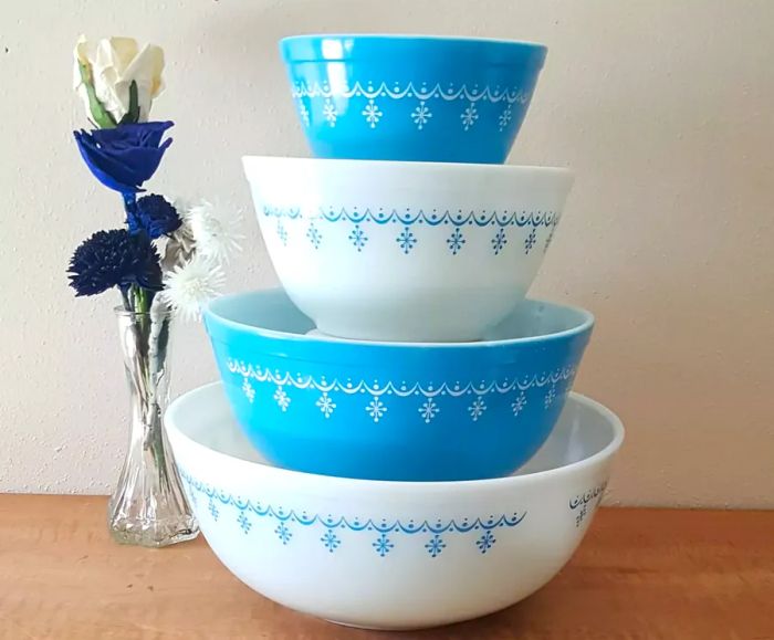 Vintage white and blue glass bowls featuring a snowflake design