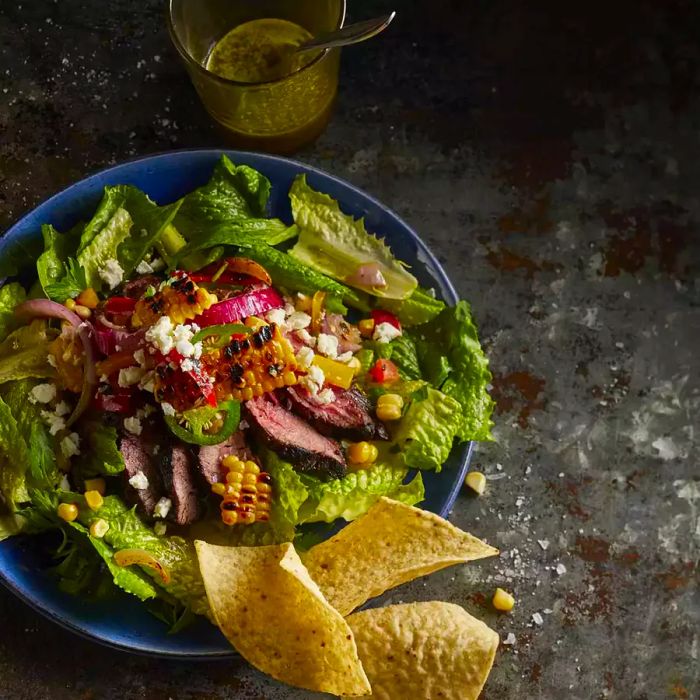 moody, artistic shot of a steak salad