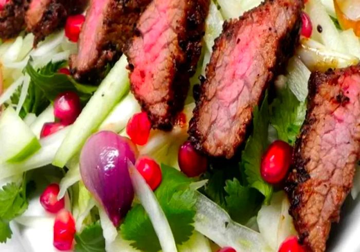 Gabe's coffee-crusted hanger steak served with a fresh apple, fennel, and herb salad. Photo by Soup Loving Nicole.