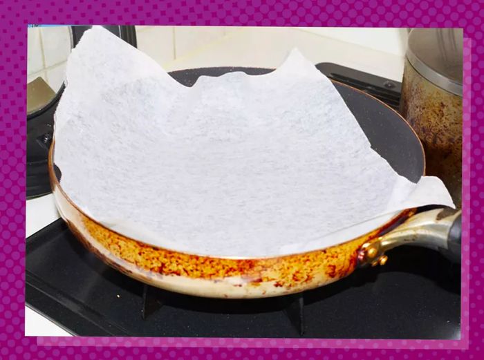 a skillet lined with parchment paper on a countertop