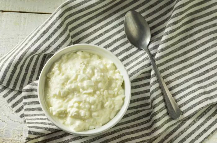 A bowl of freshly made low-fat cottage cheese, ready to serve