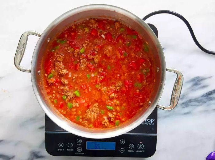 A large pot of hearty beef and tomato chili